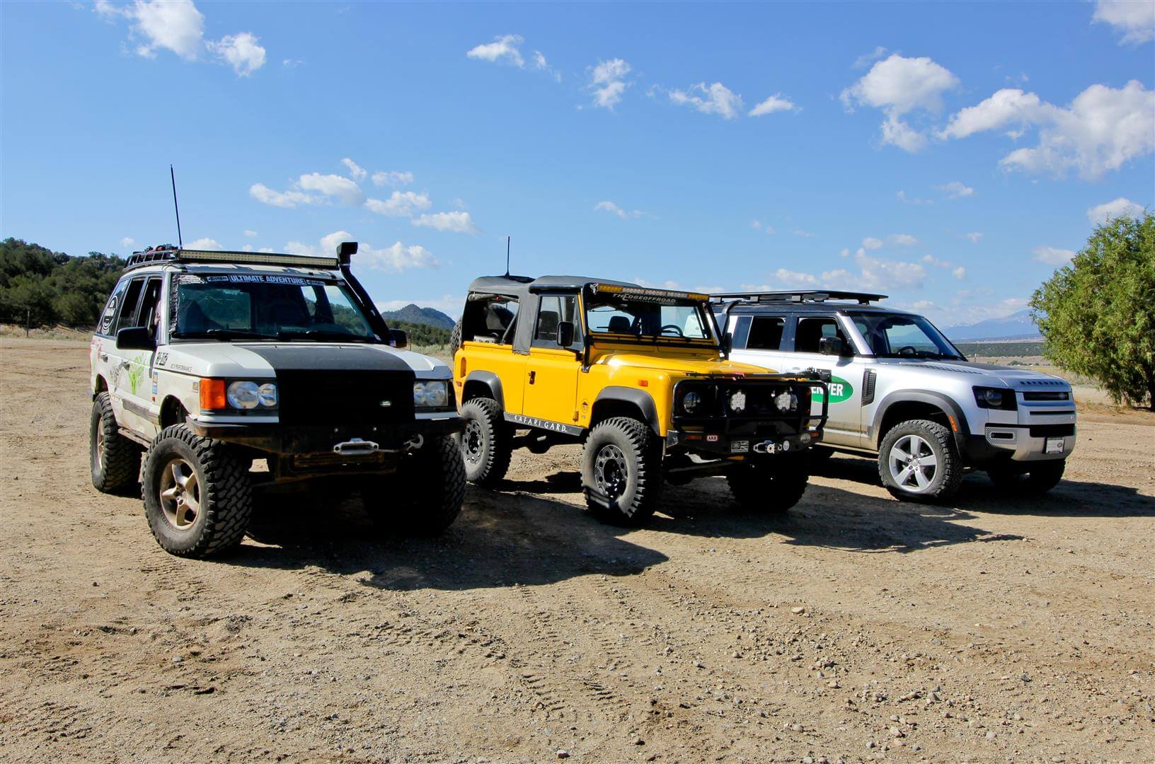 Trail head lineup with the New Defender