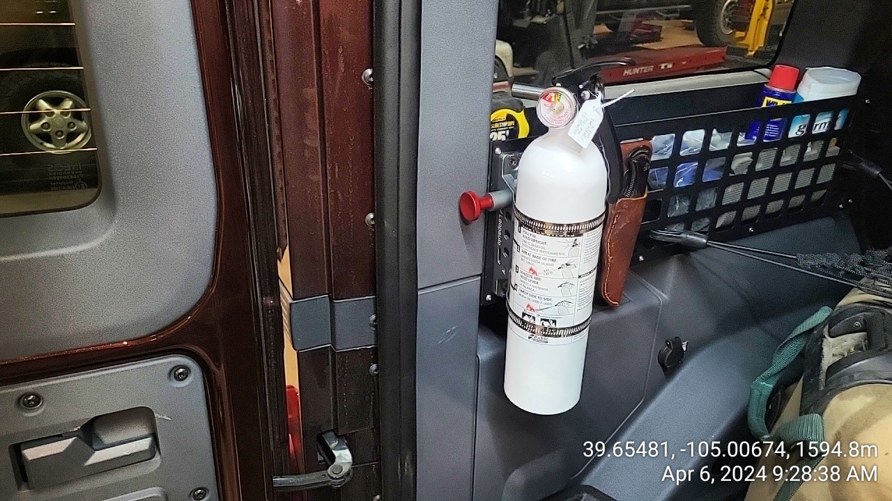 Driver's Mole panel & extinguisher